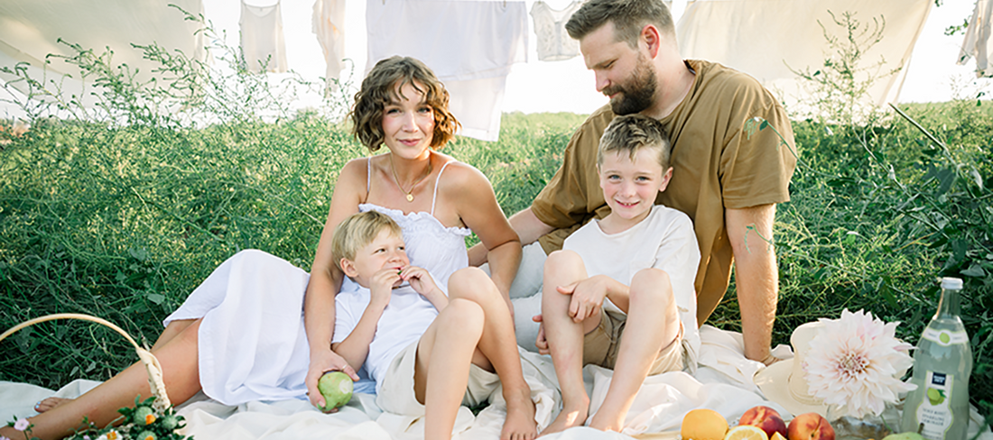 A family having a picnic in the park.