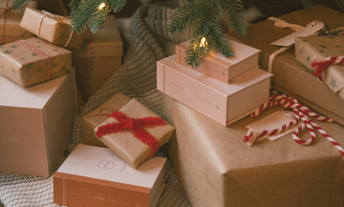 Wrapped presents beneath a Christmas Tree.