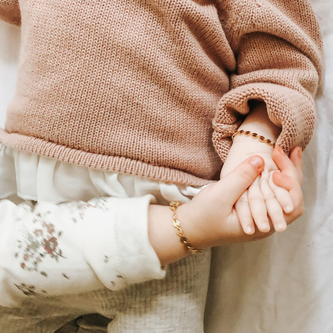 A Baby Poppy bracelet, a dainty jewelry gift for new moms.