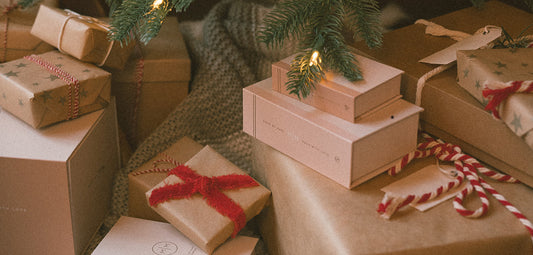 Wrapped presents beneath a Christmas Tree.