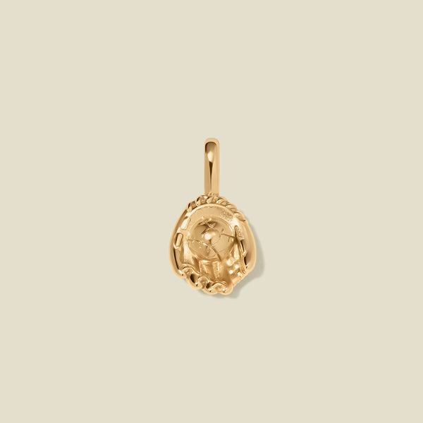 A gold baseball mitt charm, set against a solid beige background.