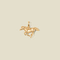 A gold running horse pendant charm.