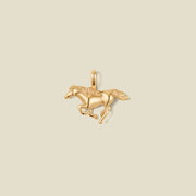 A gold running horse pendant charm.