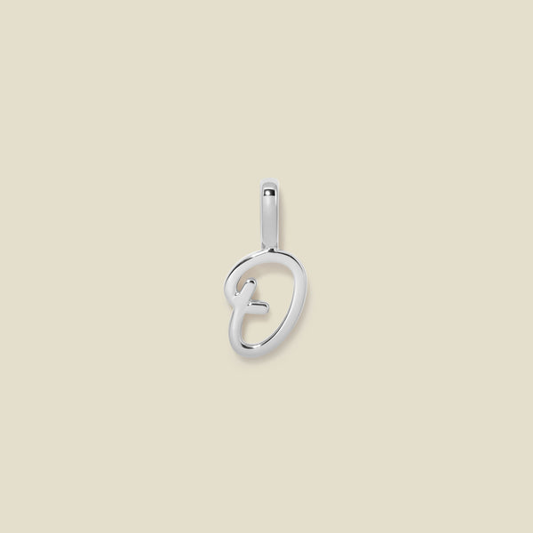 A polished silver initial pendant charm shaped like the letter 'O' in a cursive script, centered on a solid light beige background.