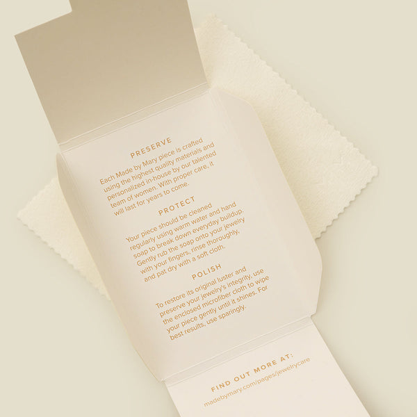 The inside of a white box with information about how to clean and polish your jewelry. The sections are titled 'PRESERVE', 'PROTECT', and 'POLISH'.